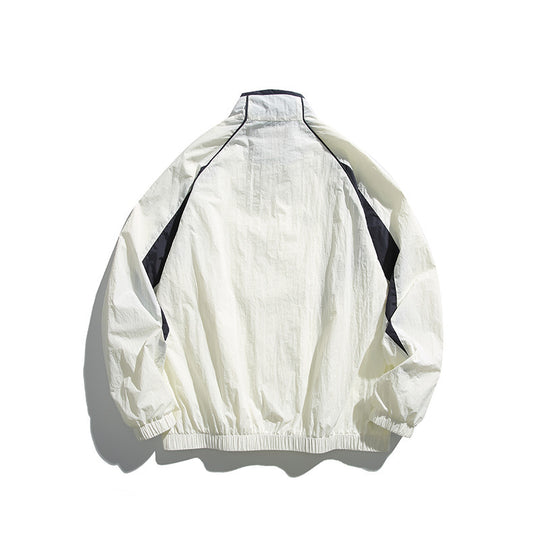 Unisex Leichte Boxy-Kapuzenjacke im Windbreaker-Stil mit Kontrastpaneelen und Raglanärmeln Shop Nory