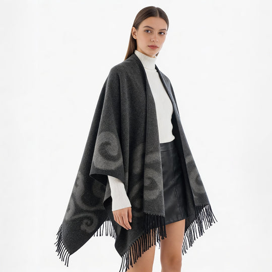 Damen Wollmix-Poncho mit Jacquard‑Wirbelmuster, V-Ausschnitt und Fransen Shop Nory