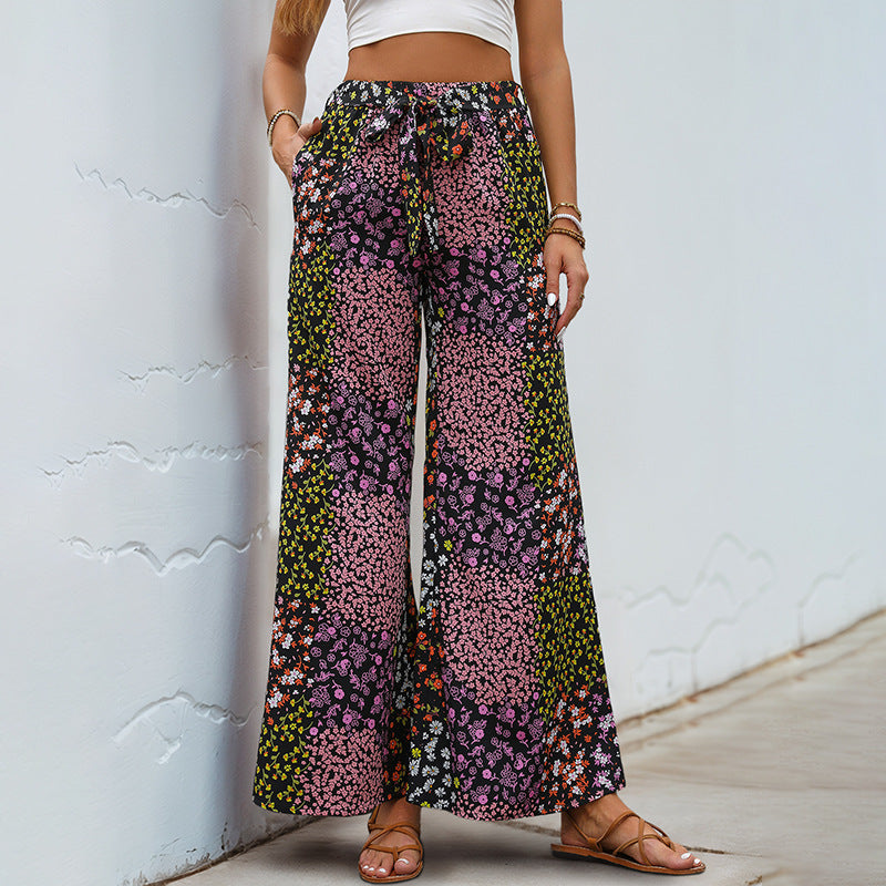 Damen Weite High-Waist Palazzo-Hose mit floralem Patchworkprint, Tunnelzug und Seitentaschen Shop Nory