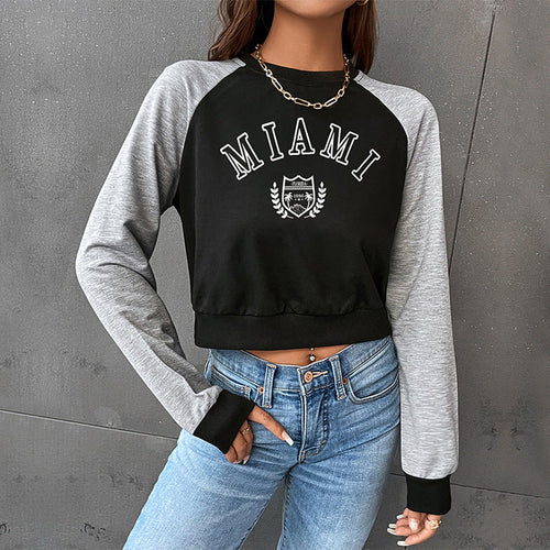 Damen Kurzgeschnittenes College-Cropped-Sweatshirt mit Raglanärmeln und elastischem Saum Shop Nory