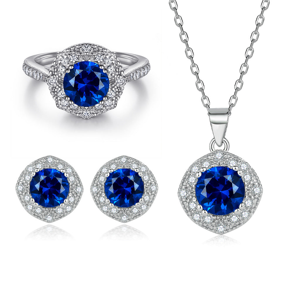 Damen Ohrstecker mit facettierten blauen Kristallen und funkelndem Zirkonia-Rahmen Shop Nory