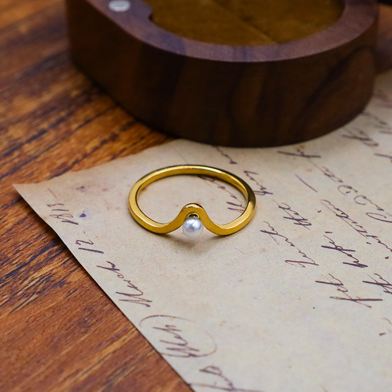 Damenring mit elegantem Design und Perle Shop Nory