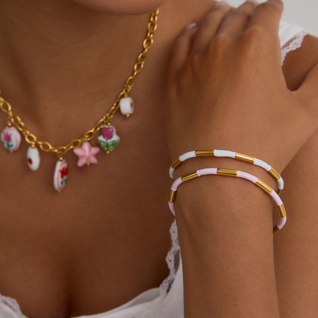 Damen Offenes Armband mit elegantem goldenen und weißen Design Shop Nory