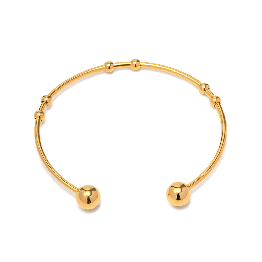 Damen Offenes Armreif mit elegantem Spiral-Design und Goldakzenten Shop Nory