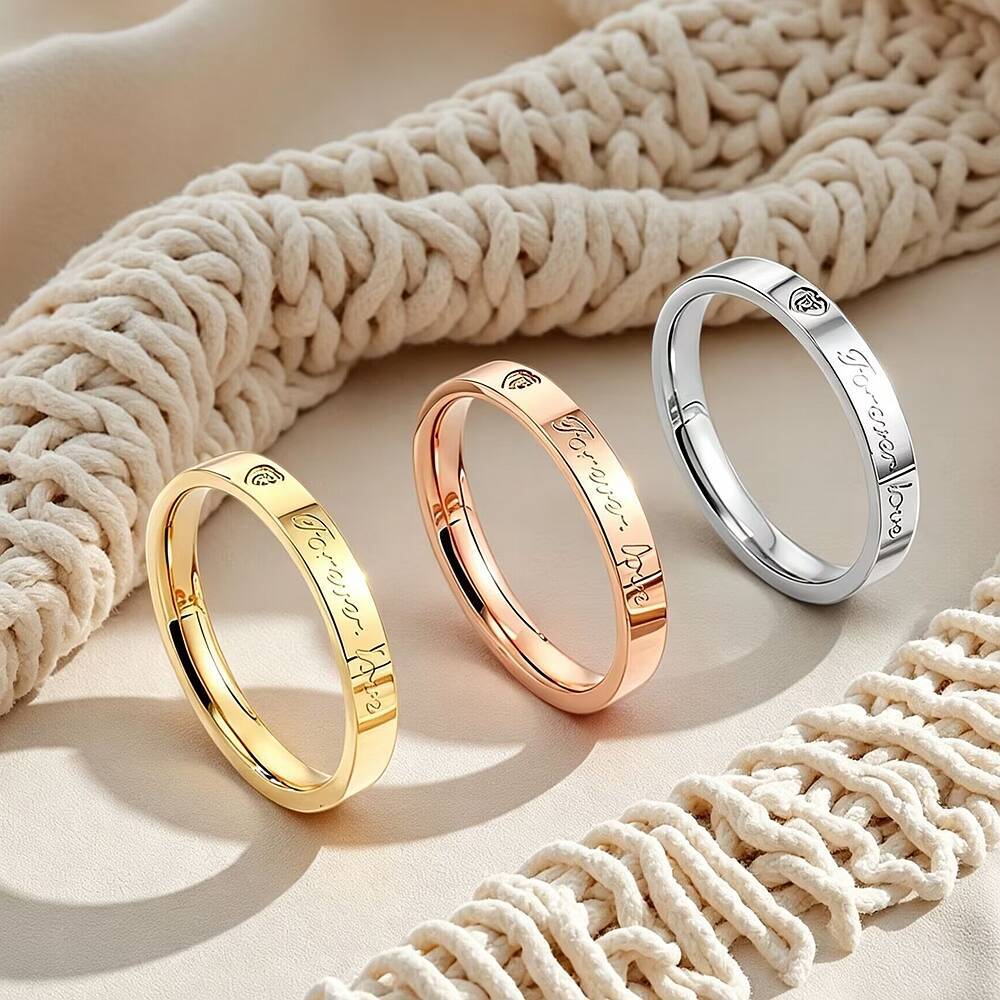 Damen Ring mit eingraviertem Liebesschriftzug und herzförmigem Zirkonia Shop Nory