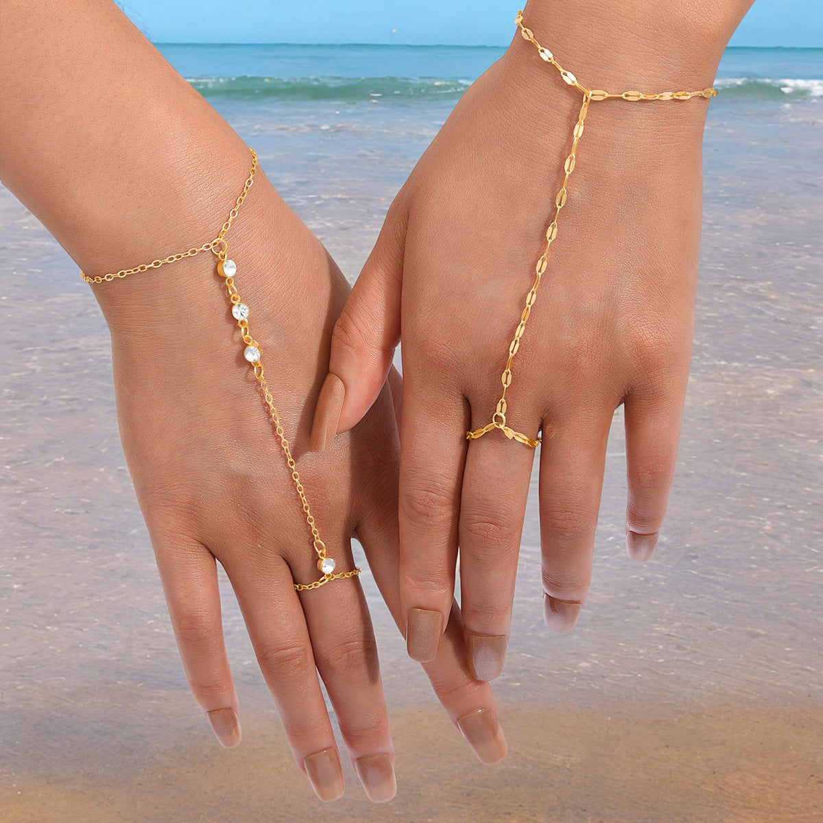 Damen Handkette aus elegantem Metall mit funkelnden Zirkonia Shop Nory