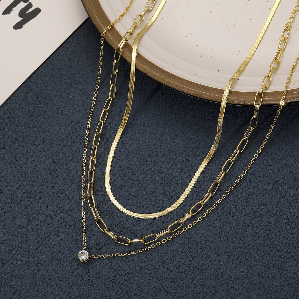 Damen mehrlagige Halskette mit zarten goldenen Ketten und funkelndem Anhänger Shop Nory