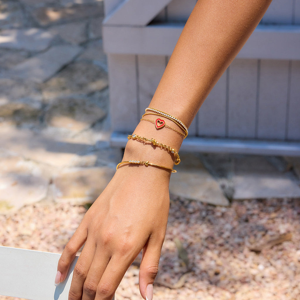 Damen Armband mit verzweifeltem Knoten und funkelnden Zirkonia-Elementen Shop Nory