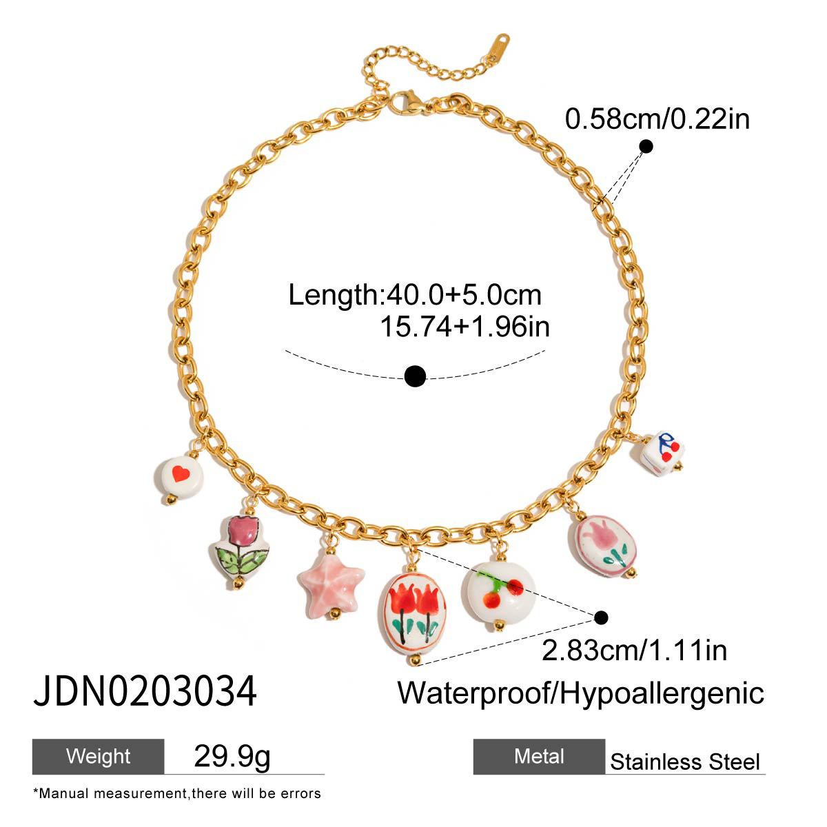 Damen Armband mit bunten charmierenden Anhängern aus hypoallergenem Edelstahl Shop Nory