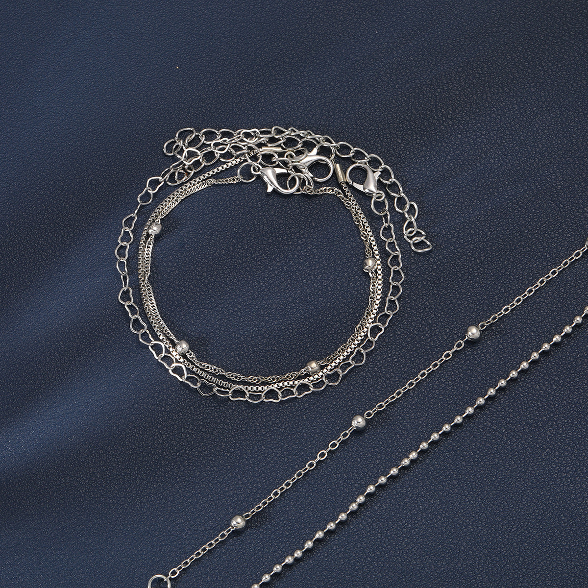 Damen Armreifen-Set mit zarten Herz- und Perlendetails Shop Nory