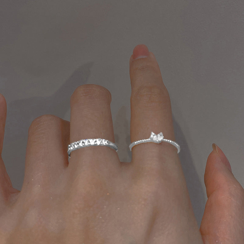 Damenring mit filigranem Schmetterlingsdesign und funkelnden Akzenten Shop Nory