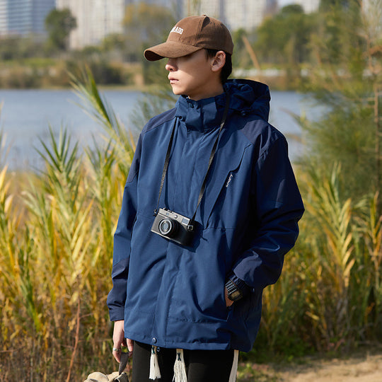 Damen zweilagige wasserabweisende Outdoorjacke mit Kapuze, Taillenregulierung und Kontrastbesätzen Shop Nory