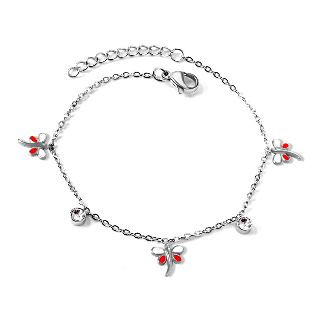 Damen Armband mit filigranen Blumenmotiven und funkelnden Kristallen Shop Nory