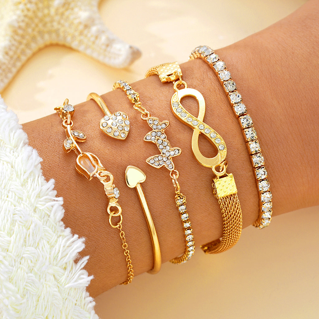 Damen Armband-Set mit funkelnden Zirkonia und modischen Anhängern Shop Nory