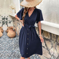 Damen Midi-Kleid mit eleganter Wickeloptik und praktischen Knopfdetails