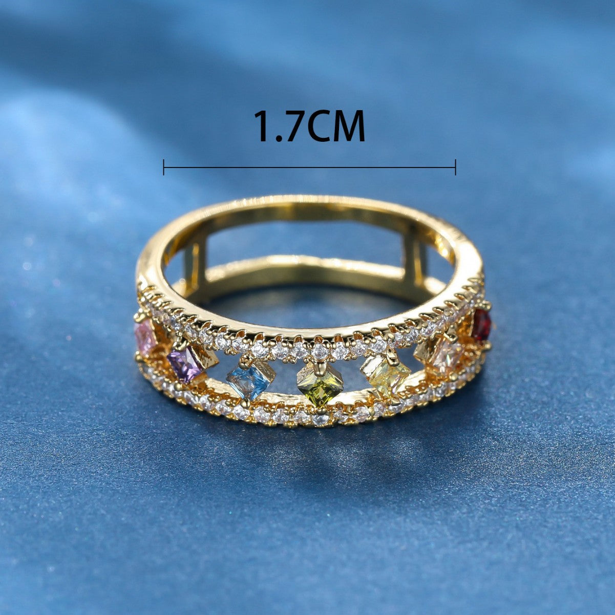 Damen Ring mit funkelnden, farbigen Zirkonia und eleganter Goldfassung Shop Nory