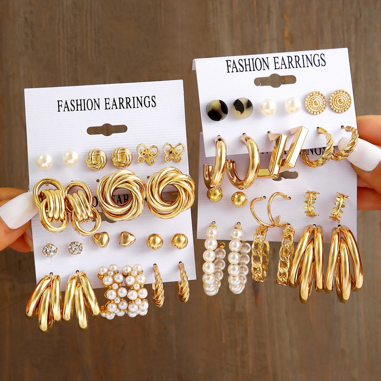 Damen Ohrringe Set mit glamourösen goldenen Designs Shop Nory