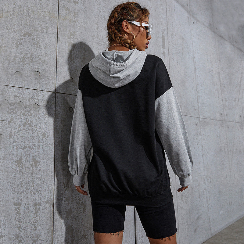 Damen Oversize Sweatshirt mit Kapuze, Kontrastärmeln und Kängurutasche Shop Nory