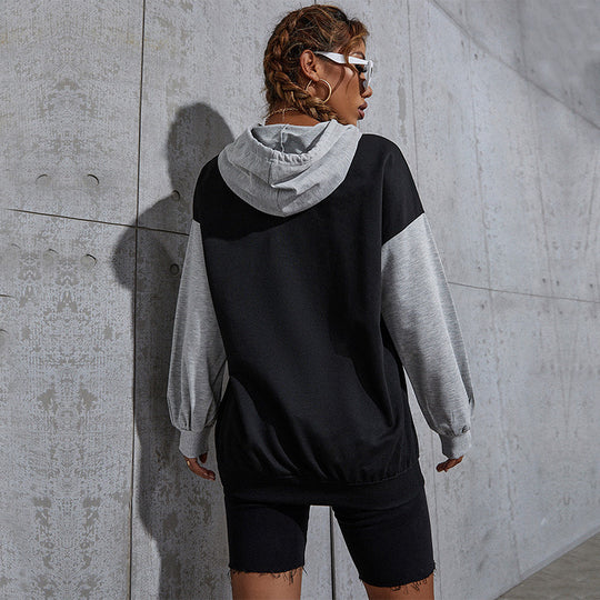 Damen Oversize Sweatshirt mit Kapuze, Kontrastärmeln und Kängurutasche Shop Nory