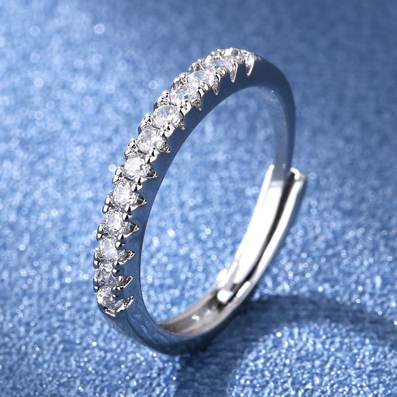Damen Zierlicher Ring mit funkelnden Zirkonia-Steinen Shop Nory