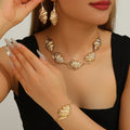 Damen Schmuckset mit kunstvollem Muschel-Design Shop Nory