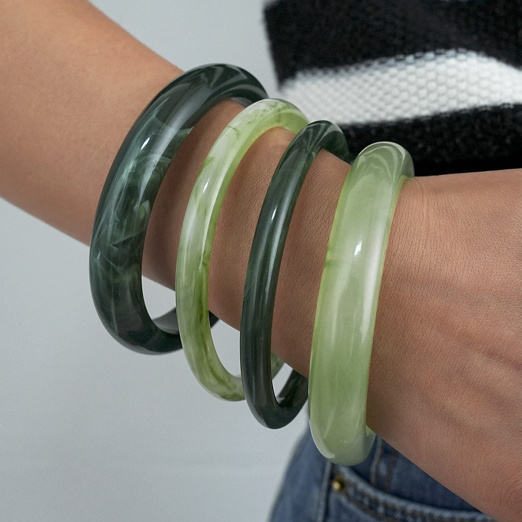 Damenarmreif mit geschwungenem Design und glänzender Oberfläche Shop Nory