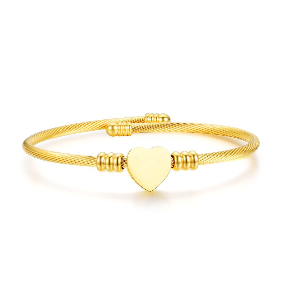 Damen Armreif mit stilvollem Herzanhänger aus hochwertigem Edelstahl Shop Nory