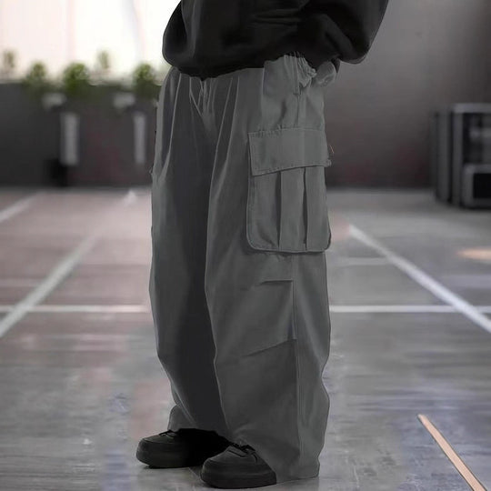 Herren Oversize-Baggy-Cargohose im Urban-Utility-Stil mit elastischem Tunnelzugbund und Mehrfachklappentaschen Shop Nory