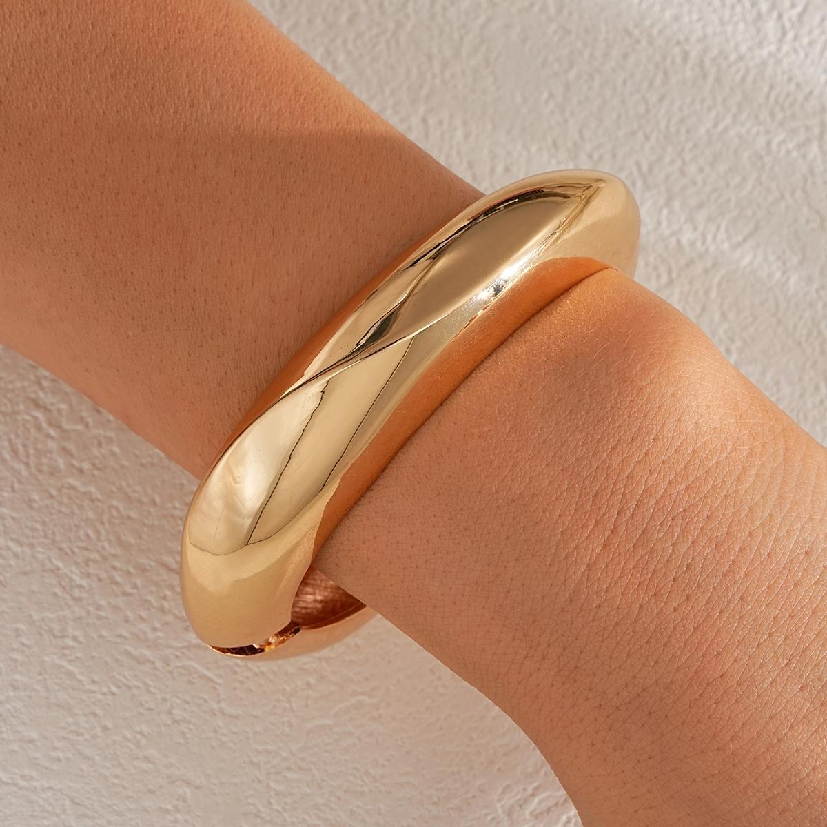 Damen Eleganter Armreif aus hochwertigem, geschwungenem Metall Shop Nory