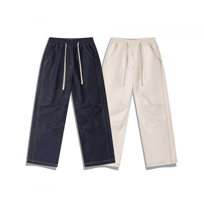 Unisex Weite Denim-Hose mit elastischem Bund, Kordelzug und gesteppter Kniepasse Shop Nory