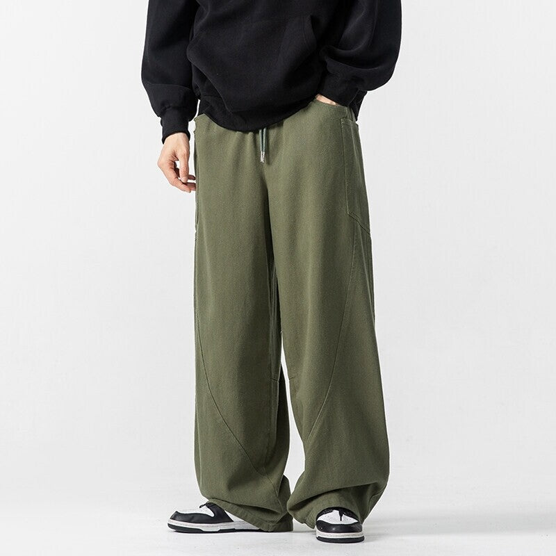 Herren Weite Loungehose mit Tunnelzug, aufgesetzten Taschen und markanten Panelnähten Shop Nory