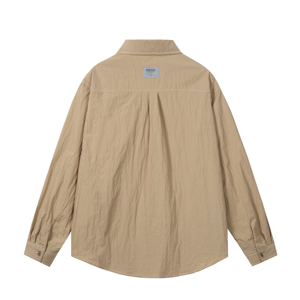 Unisex Oversize-Hemdjacke mit markanten Kontrastnähten und aufgesetzten Brusttaschen Shop Nory