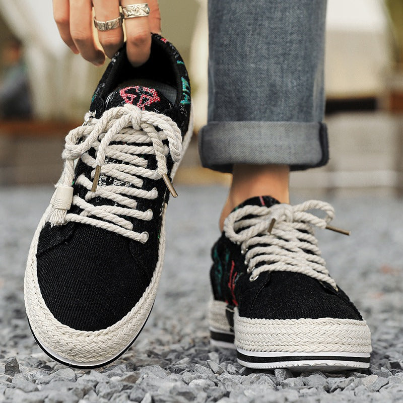 Damen bestickte Canvas‑Sneaker mit Quastenanhänger und geflochtener Plateausohle Shop Nory