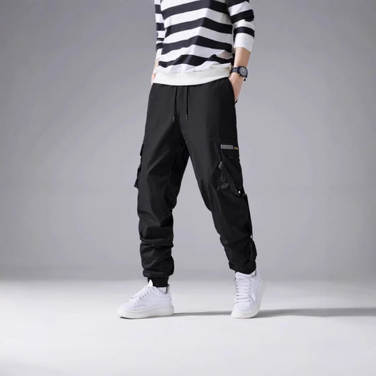 Herren Konisch geschnittene Utility‑Cargohose im Joggerstil mit Multifachtaschen, Kordelzug & elastischem Knöchelabschluss Shop Nory