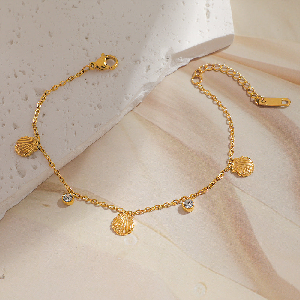 Damen zierliches Armband mit Muschel-Design und funkelndem Kristall Shop Nory