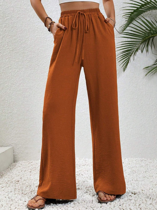 Damen Leichte, weit geschnittene Strandhose mit Elastikbund, Kordelzug und Seitentaschen Shop Nory