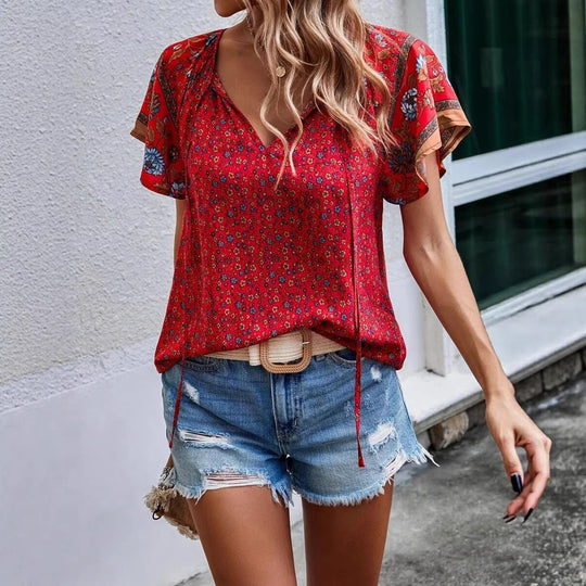 Damen Leichtes Blusenshirt mit V-Ausschnitt, kurzen Kimonoärmeln und floralem Allovermuster Shop Nory