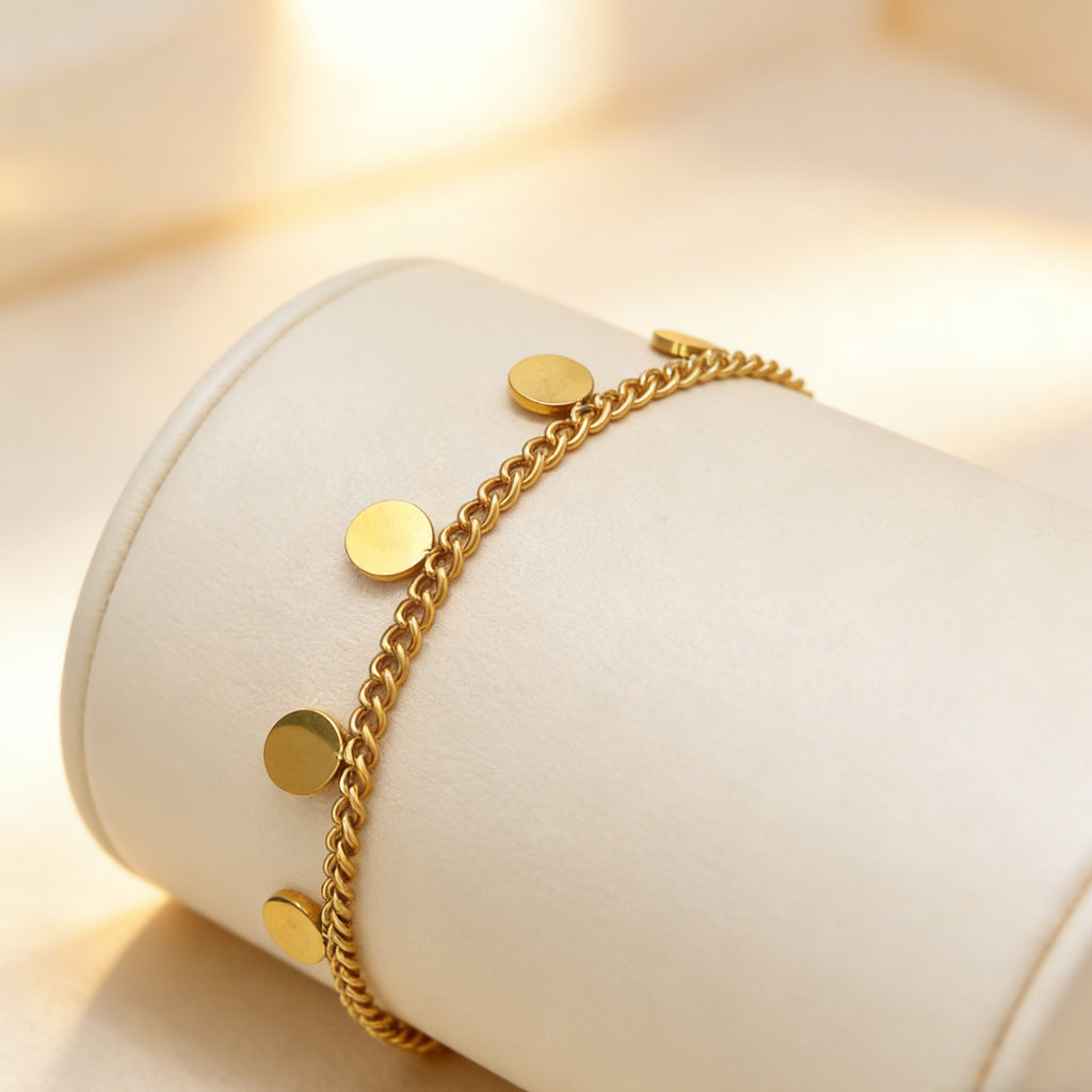 Damen stilvolles Armband mit glänzenden, runden Anhängern aus Edelstahl Shop Nory