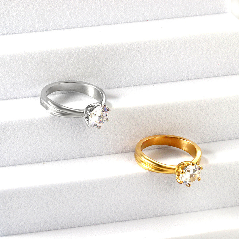 Damen Ring mit brillantem Zirkonia und eleganter Edelstahlfassung Shop Nory