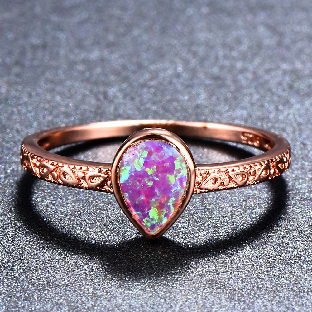 Damen Ring mit tropfenförmigem Opal und filigraner Zirkonia-Verzierung Shop Nory