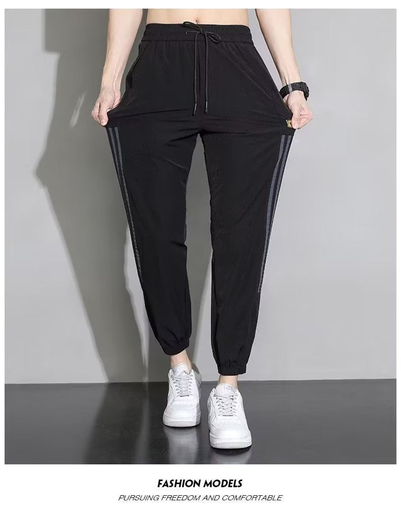 Damen Sportliche Trainingshose mit seitlichen Streifen Shop Nory