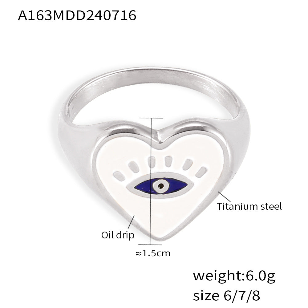 Damenring mit herzförmigem Design und Eye-Emblemen Shop Nory