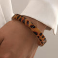 Damen Armreifen aus hochwertigem Acryl mit einzigartigem Leopardenmuster Shop Nory
