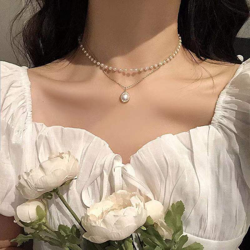 Damen mehrlagige Halskette mit zarten Perlen und tropfenförmigem Anhänger Shop Nory