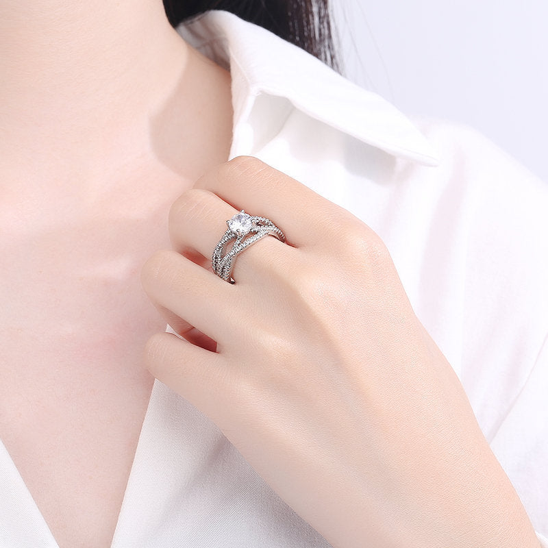 Damen eleganter Zirkonia-Verlobungsring mit geschwungenem Design Shop Nory