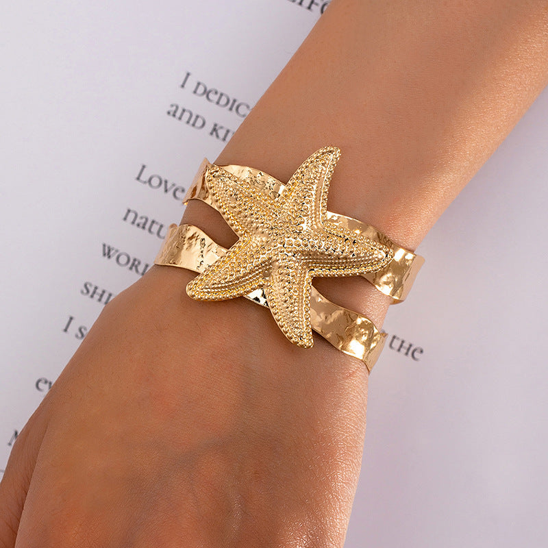 Damen Offener Armreif mit maritimem Muschel- und Seestern-Design Shop Nory