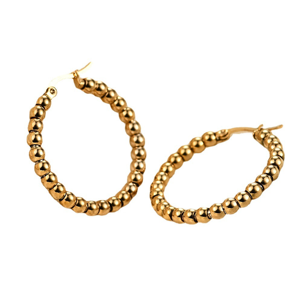 Damen Creolen aus hochwertigem Edelstahl mit glänzenden Kugeldetails Shop Nory
