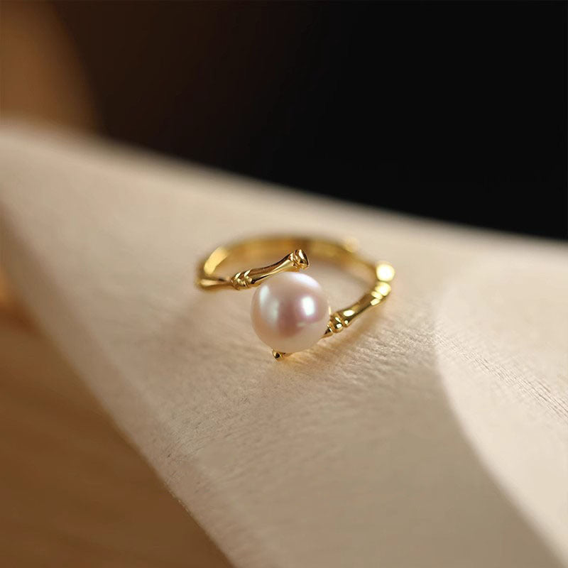 Damen Zierlicher Ring mit hochwertiger Perle und kunstvoller Fassung Shop Nory