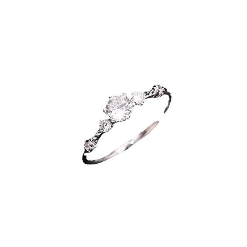 Damen eleganter Ring mit funkelndem Zirkonbesatz und verspieltem Design Shop Nory
