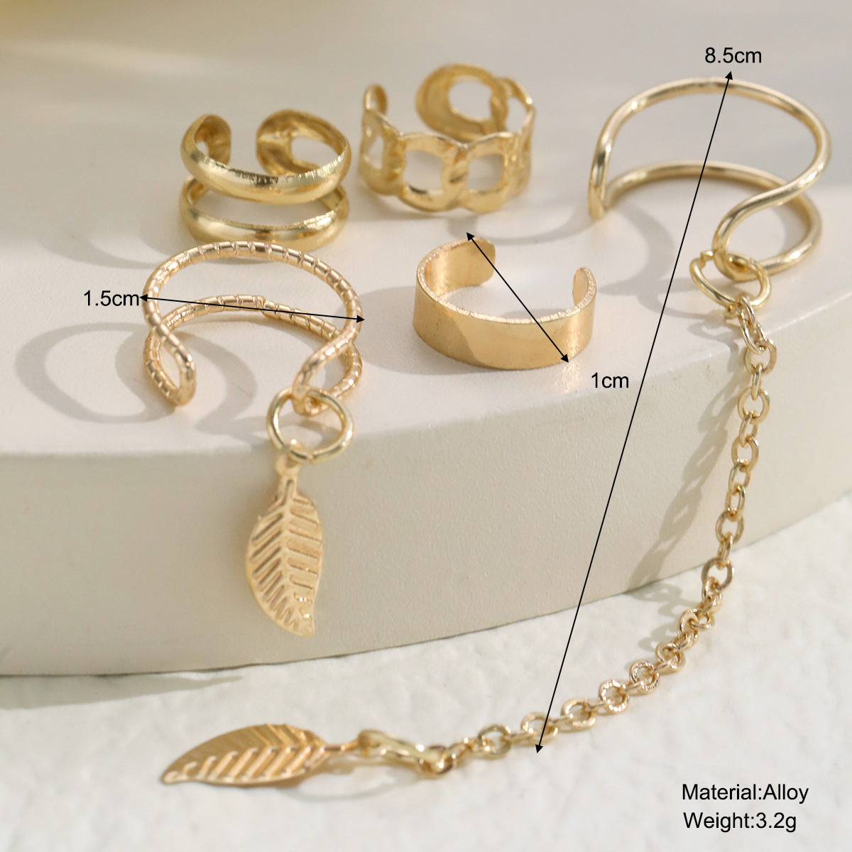 Damen Ohrcuff mit elegantem Blätterdesign und feinen Kettenakzenten Shop Nory
